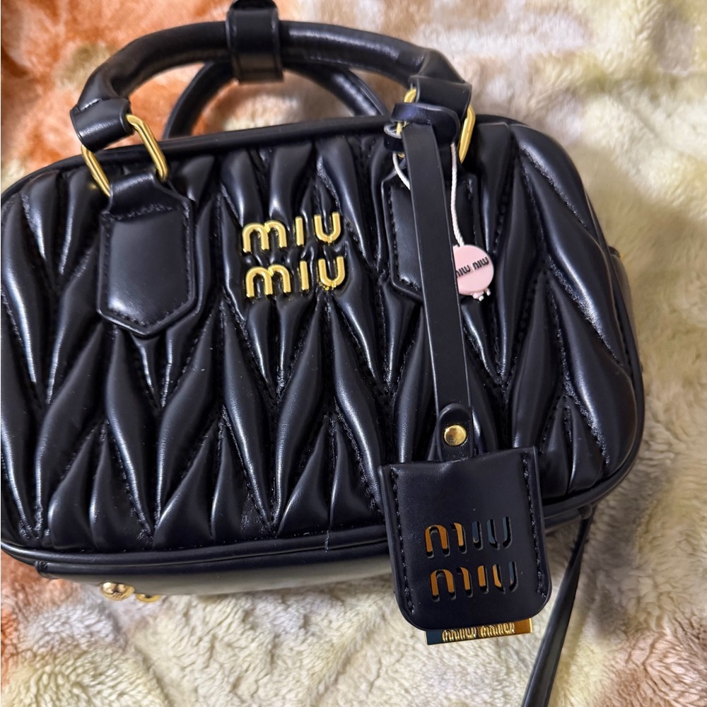 Miu Miu Black Mini Bag with Gold Details